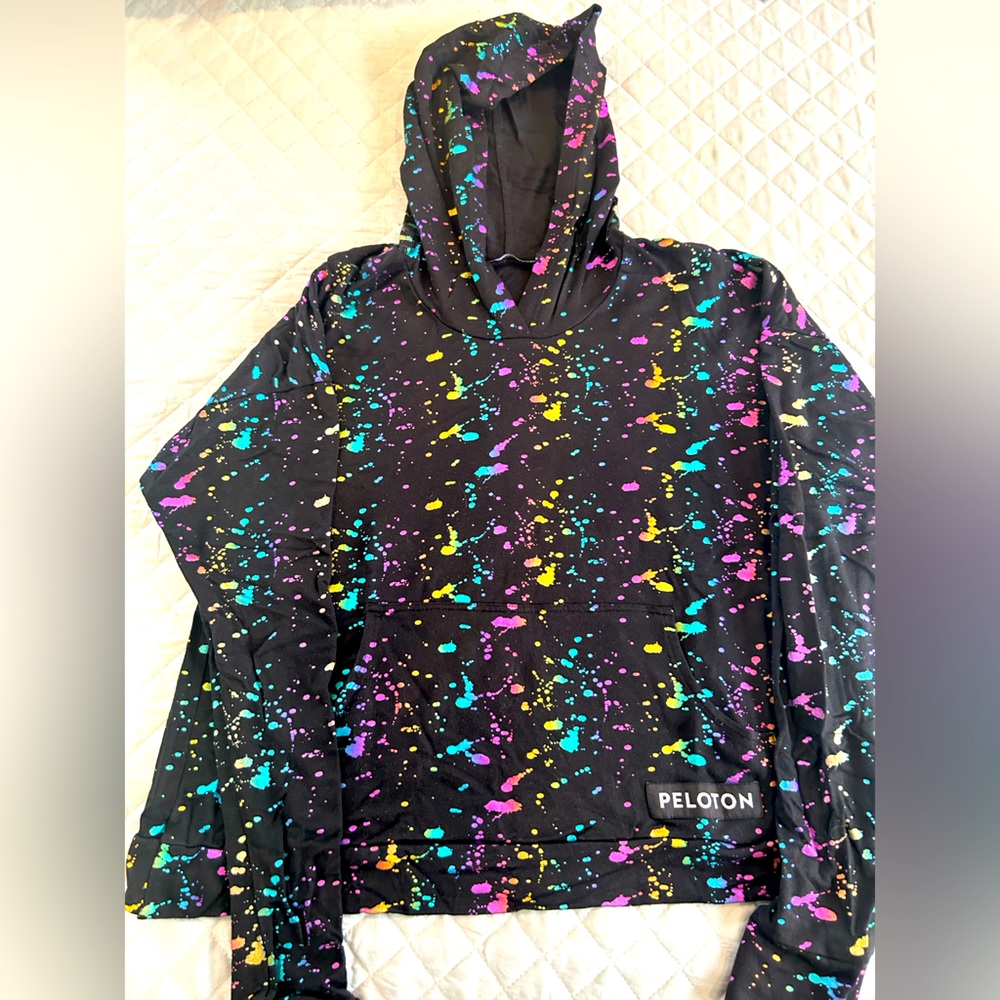 Peloton by Terez rainbow foil hooded sweatshirt with back detail. Size XS.